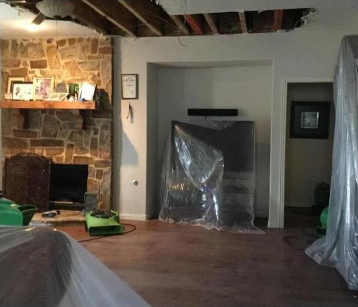 living room cleaned up and drying out from water damage